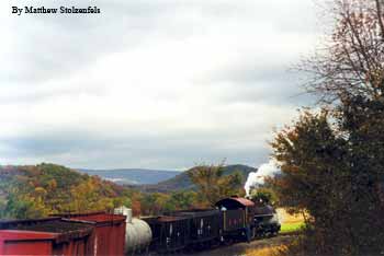 the frieght train seen from the cabose