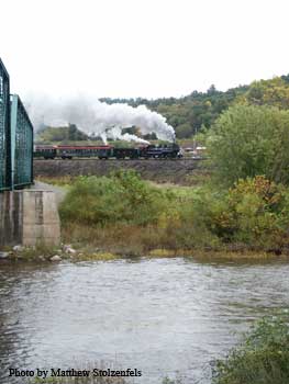 15 pulls the passenger train across the fill at runk road