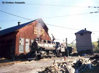 an engine passing the sand tower