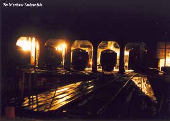 four steamers and the M1 resting in the roundhouse