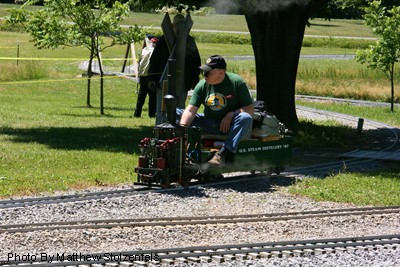 a vertical boilered locomotive on another trip